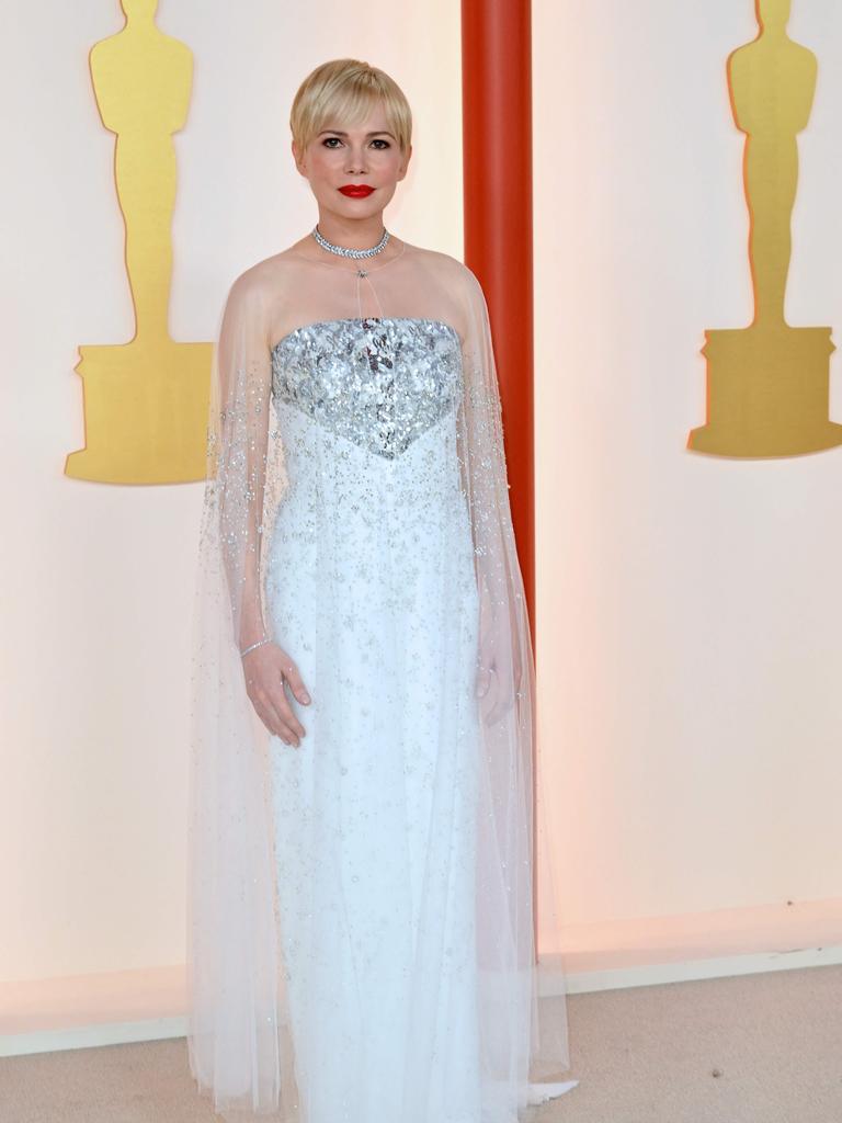 Michelle Williams in Chanel Couture with Tiffany Co. jewellery. (Photo by ANGELA WEISS / AFP)