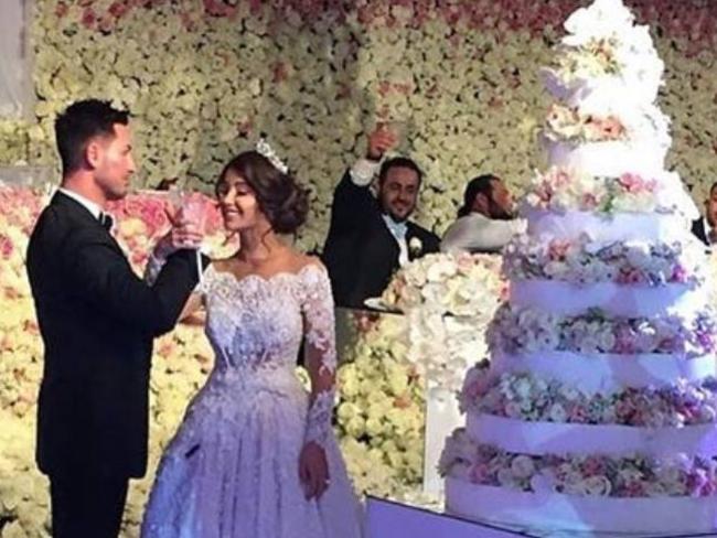 Mr Mehajer shows off his ‘second suit for the evening’, new bride and towering cake.