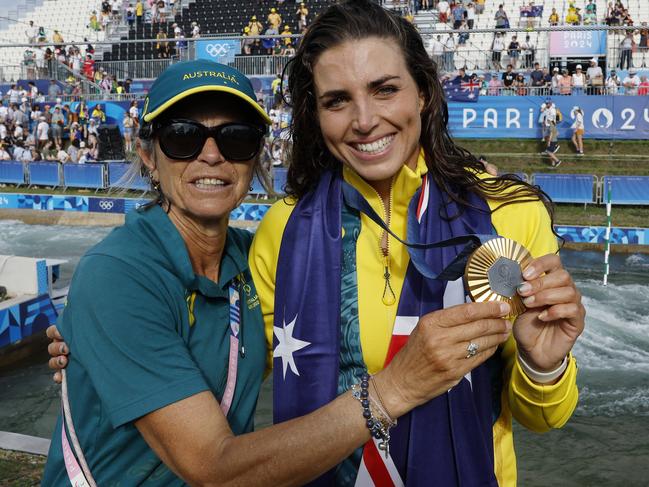 Jess Fox and her mum Miriam with her gold medal. Pic: Michael Klein