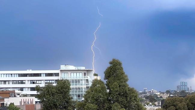 Lightning over Melbourne, as stormy weather hit on Thursday afternoon. Picture: Jason Edwards