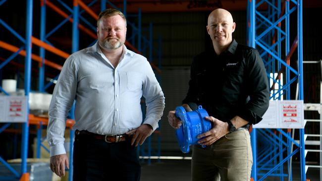 Aaron Power from Colliers Townsville with Clover Pipelines regional sales manager Clint Turner. Picture: Evan Morgan