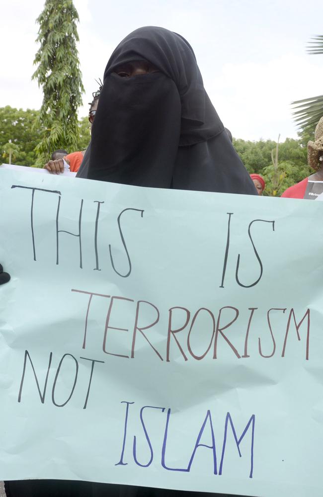 This is not Islam: A woman in purdah takes part in a rally protesting for the release of the kidnapped school girls. AFP PHOTO / PIUS UTOMI EKPEI