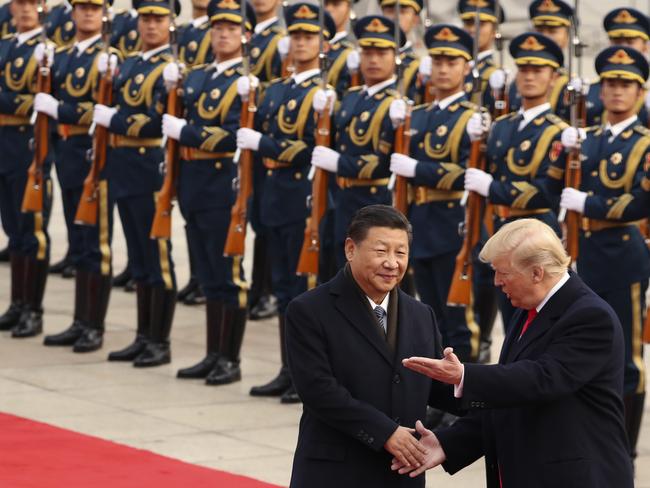 President Donald Trump and Chinese President Xi Jinping participate in a welcome ceremony at the Great Hall of the People in Beijing, China in November. Picture: Andrew Harnik/AP