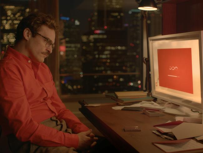 JOAQUIN PHOENIX as Theodore in the romantic drama film HER, directed by Spike Jonze