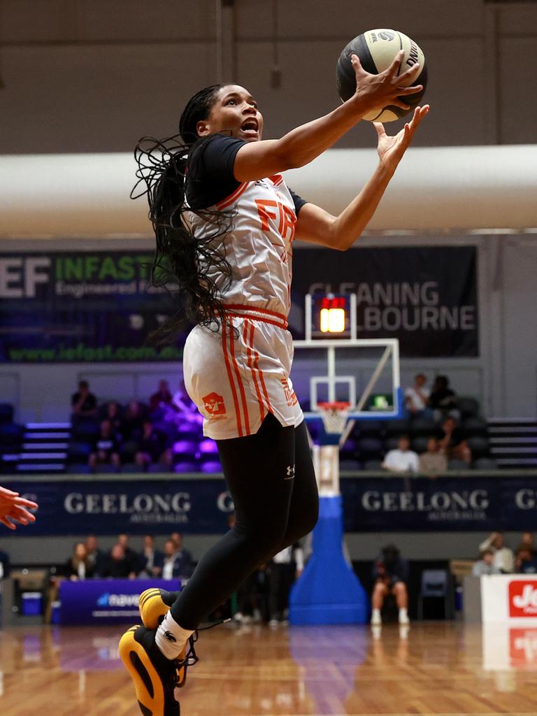 GEELONG, AUSTRALIA - OCTOBER 30: Zia Cooke of the Townsville Fire drives to the basket during the round one WNBL match between Geelong United and Townsville Fire at The Geelong Arena, on October 30, 2024, in Geelong, Australia. (Photo by Kelly Defina/Getty Images)