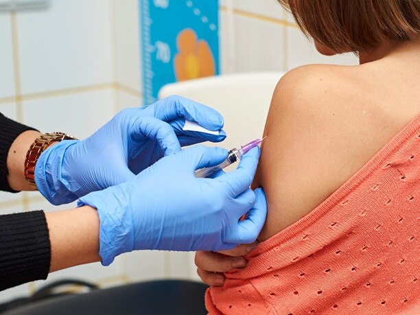 RendezView.Nurse making vaccine injection to teenage girl shoulder. (Pic: iStock)