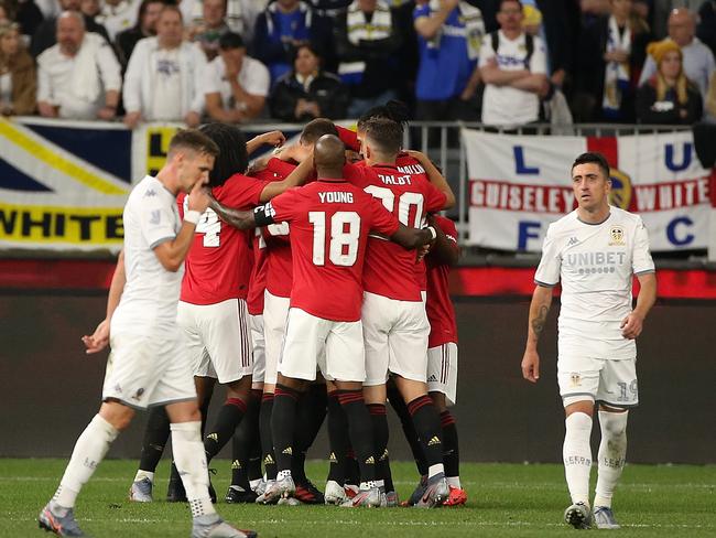 Manchester United celebrate their huge friendly win.