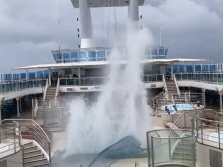 Water from the pool on board the Coral Princess cruise ship is seen spurting up during rough weather. The ship will remain off the Caloundra coast overnight, marking another night in rough seas for her more than 2000 passengers. Picture: Channel 7 News