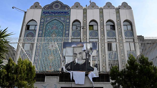 The Iranian embassy was ransacked after anti-government fighters took Damascus. Picture: AFP.