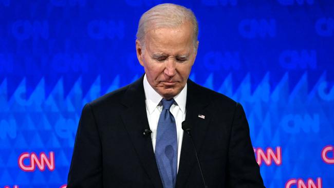 President Joe Biden looks down as he participates in the first presidential debate of the 2024 elections with former US President and Republican presidential candidate Donald Trump. Picture: Andrew Caballero-Reynolds/AFP