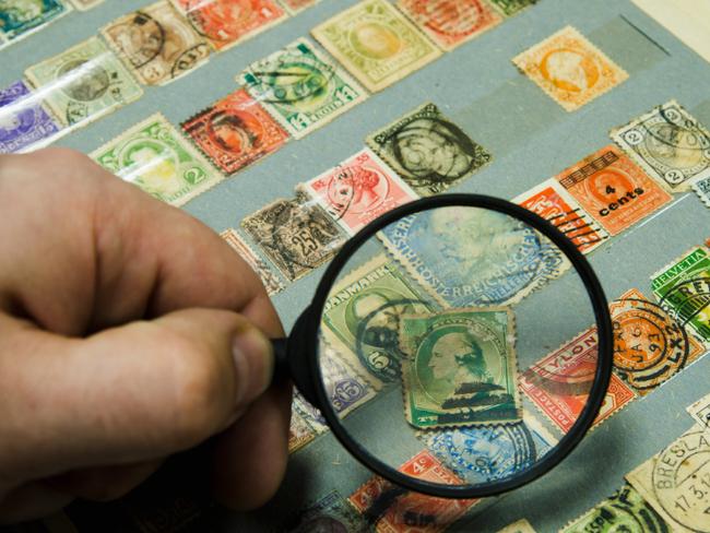 The Khan brothers, Shaheryer and Obaid were charged after 2.4 million fraudulent stamps were found at their Lygon St apartment.