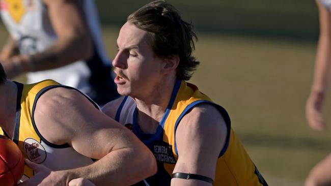 HurstbridgeÃs Mitchell Moschetti  and MacleodÃs Kurt Manuel during the NFNL Macleod v Hurstbridge football match in Rosanna, Saturday, June 17, 2023. Picture: Andy Brownbill