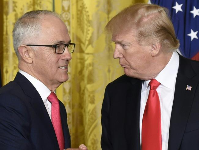 US President Donald Trump (R) and Australian Prime Minister Malcolm Turnbull are seen following a joint press conference in the East Room of the White House in Washington, DC, February 23, 2018. / AFP PHOTO / SAUL LOEB