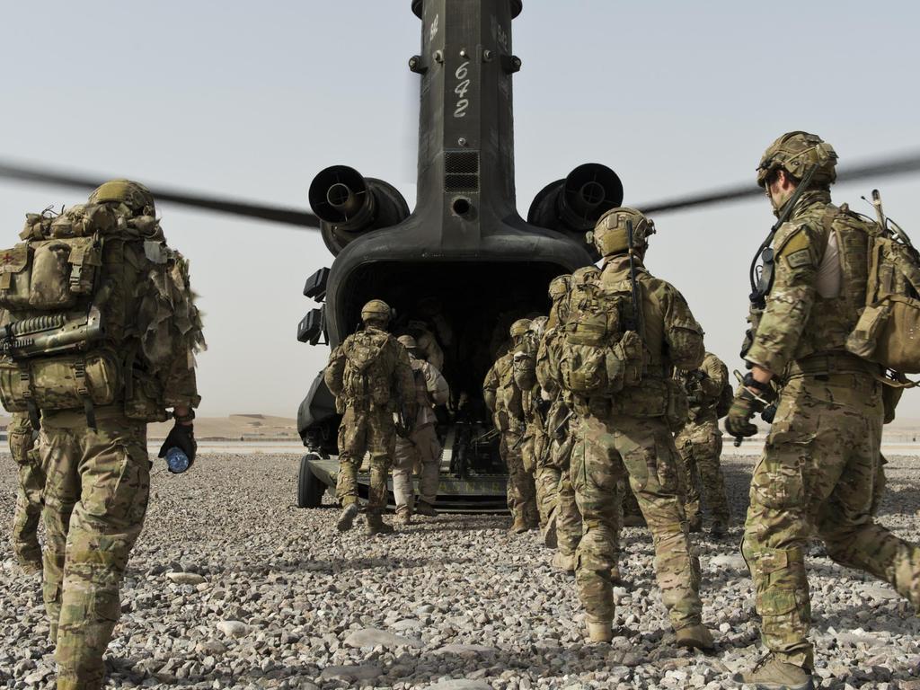 Australian Army soldiers from Special Operations Task Group and their Afghan National Security Force partners board a US Army CH-47 Chinook helicopter at Multinational Base Tarin Kowt, Uruzgan province, southern Afghanistan, in 2012.