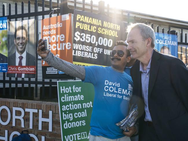 Minister for Immigration David Coleman with a campaigner throughout the 2019 Federal Election. Picture: Matthew Vasilescu