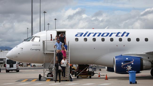 The first ever Airnorth direct flight from Brisbane West Wellcamp Airport in Toowoomba has touched down at Cairns Airport. Passengers disembark the aircraft. PICTURE: BRENDAN RADKE