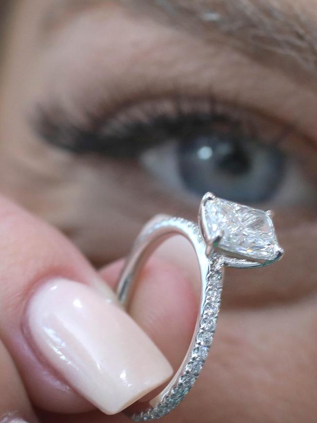 Daniella Adey and her bespoke Class A diamond engagement ring. Picture Dean Martin