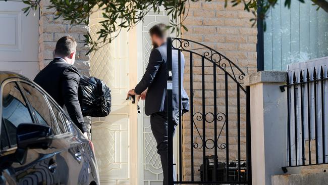 Federal officers enter the home of NSW Labor MP Shaoquett Moselmane in Sydney’s Rockdale on Friday June 26. Picture: AAP