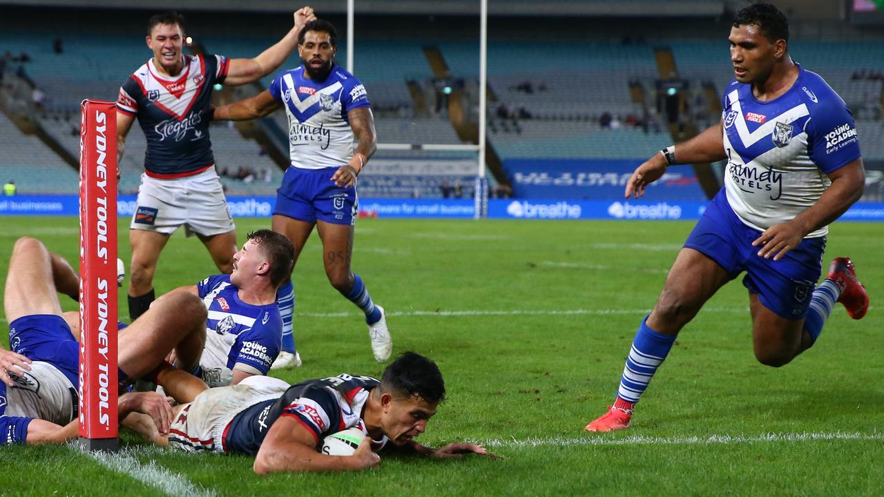 Joseph Suaalii scores for the Roosters (Photo by Jason McCawley/Getty Images)