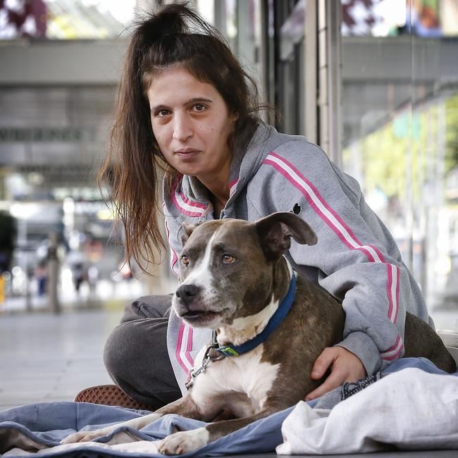 Emily and her dog Jessie take up an offer to move off Swanston St to accommodation that excepts dogs. Picture: David Caird