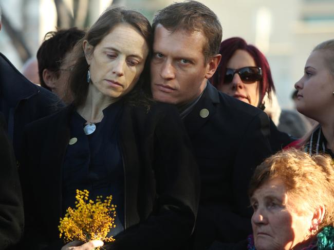 Paul Guard with his wife Jessie Wells during a National Memorial Service for the first anniversary of MH17. Guard’s parents Jill and Roger were on the flight. Picture: News Corp Australia