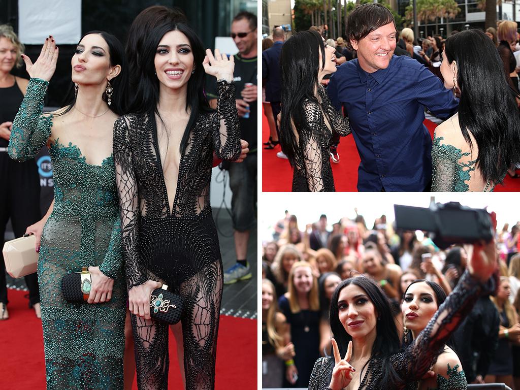 The Veronicas arrive at this year’s ARIA Awards in Sydney, greeting comedian Chris Lilly and taking selfies with fans as they walk the red carpet. Pictures: Getty/Cameron Richardson