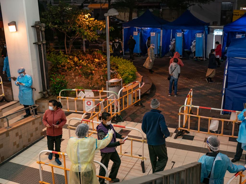 Hong Kong residents get tested for Covid in makeshift stations amid Omicron wave. Picture: Getty Images.