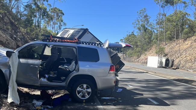 Named: Driver charged over crash that left three trapped