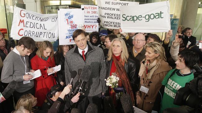 Andrew Wakefield, centre, with wife Carmel at his side, fronts the UK media in 2010. Picture: Shaun Curry/AFP