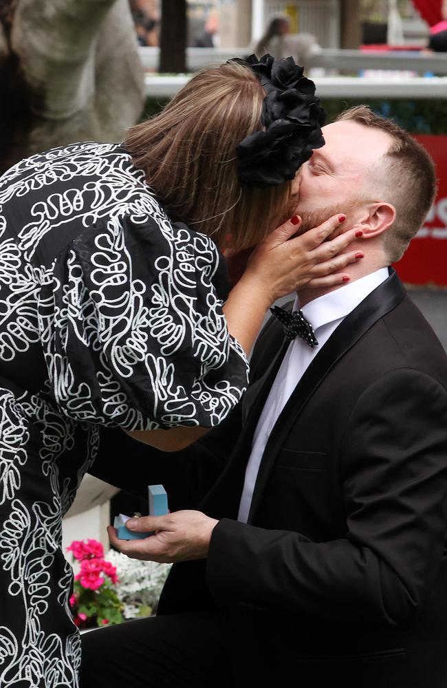 Gemma Davidson kisses Stephen Butler after his proposal. Picture: Liam Kidston