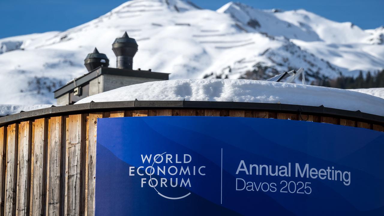 A sign denoting the World Economic Forum (WEF) is seen at the Congress Center during the WEF annual meeting in the Alpine resort of Davos on January 20, 2025. (Photo by Fabrice COFFRINI / AFP)