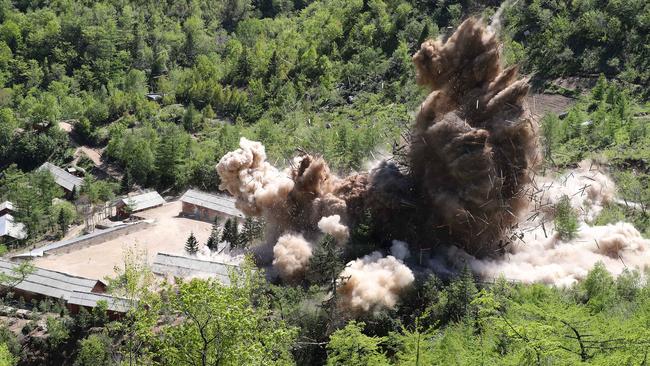 An explosion at the Punggye-ri nuclear test site, purported to show it being demolished in front of the international media in 2018 as part of an agreement.