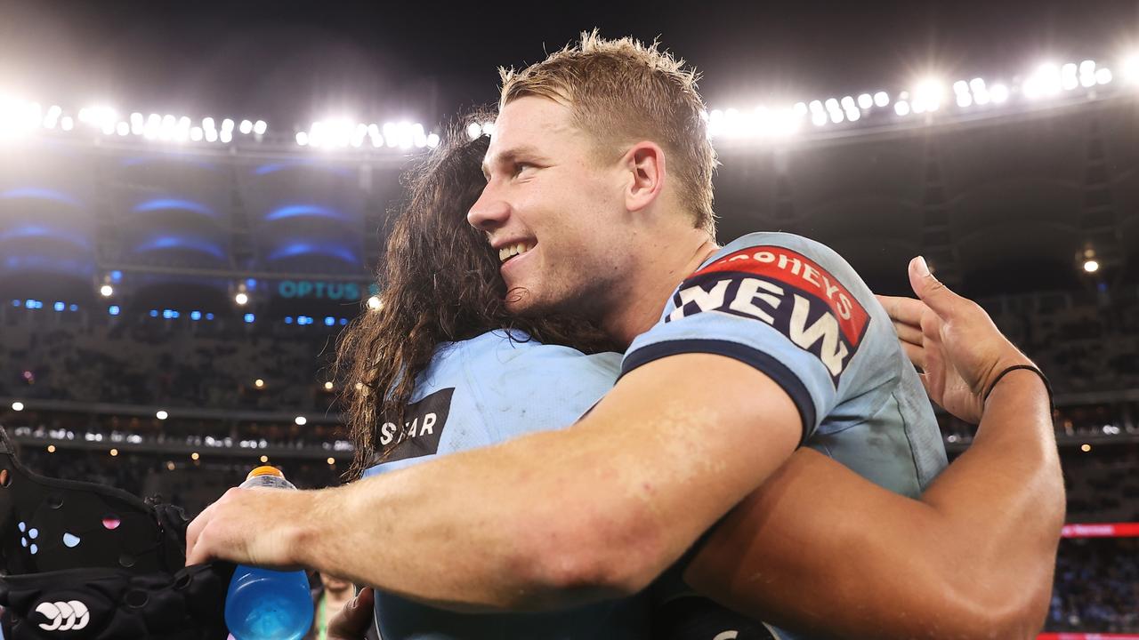 PERTH, AUSTRALIA - JUNE 26: Matt Burton of the Blues celebrates victory with team mates after game two of the State of Origin series between New South Wales Blues and Queensland Maroons at Optus Stadium, on June 26, 2022, in Perth, Australia. (Photo by Mark Kolbe/Getty Images)