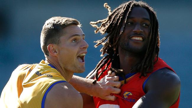 West Coast’s Nathan Vardy and Nic Naitanui work on stoppage drills in Perth