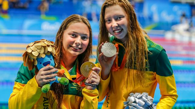 Maddison Elliott and Lakeisha Patterson show off their medals after the 50m freestyle.