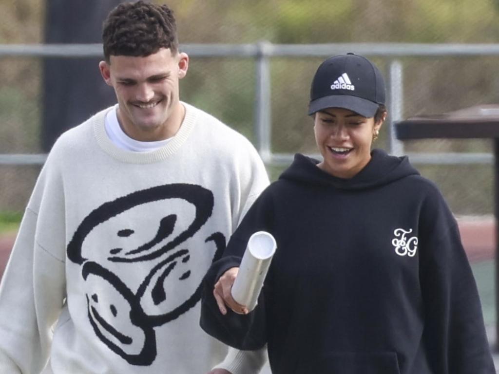 EXCLUSIVE PICTURES: Mary Fowler and Nathan Cleary leaving Penrith Panthers HQ on Friday, with Mary carrying what looks like a tube of x-ray scans. Picture: MEDIA-MODE.COM