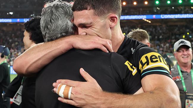 Nathan Cleary celebrates with his father and coach Ivan Cleary after winning the 2023 NRL grand final. Picture: Getty Images