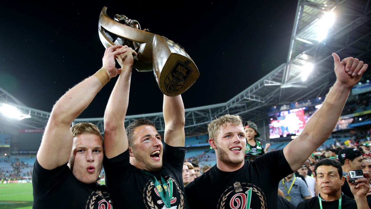 Sam Burgess celebrates with brothers Tom and George the lap of honour in 2014 NRL Grand Final between the South Sydney Rabbitohs and the Canterbury Bankstown Bulldogs at ANZ Stadium. Picture: Gregg Porteous