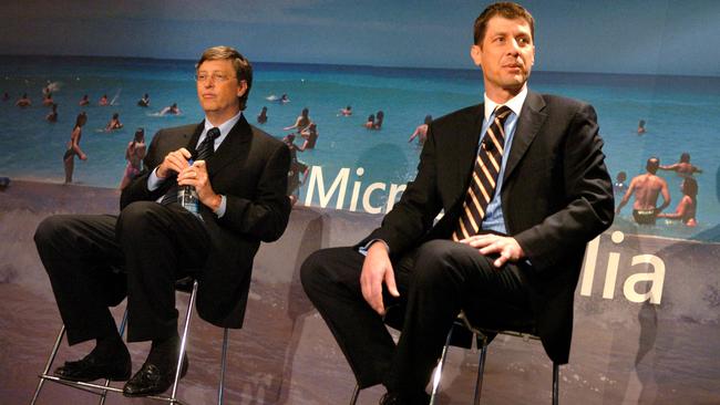 Steve Vamos, right, in 2004 with Microsoft co-founder Bill Gates. Picture: Alan Pryke