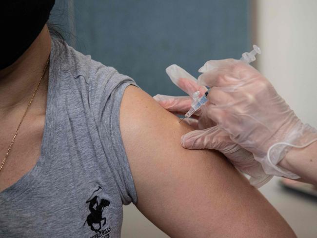 More than half of Victorian adult prisoners are fully vaccinated. Photo: Angela Weiss / AFP