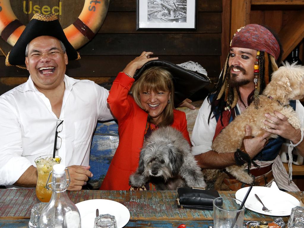 Gold Coast Mayor Tom Tate with Deputy Mayor Councillor Donna Gates received a visit from Captain Jack Sparrow impersonator Brady Mayer and his dogs Pistol & Boo dogs at the Boat Works Galley restaurant in Coomera. Picture: JERAD WILLIAMS