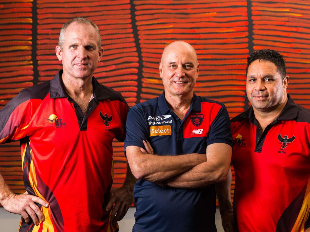 Rob Clarke with former Melbourne Football Club chief executive Peter Jackson and Ian McAdam from the Redtails. Picture: Emma Murray.