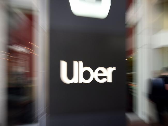 (FILES) In this file photo taken on May 8, 2019  an Uber logo is seen outside the company's headquarters in San Francisco, California . - Uber on February 10, 2021 reported a loss of $968 million in the final three months of 2020, as the smartphone-summoned ride business struggled during the pandemic. (Photo by Josh Edelson / AFP)