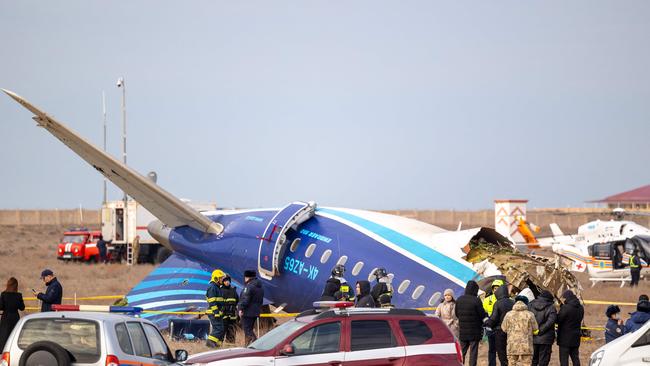 Emergency specialists work at the crash site of an Azerbaijan Airlines passenger jet near the western Kazakh city of Aktau on December 25, 2024. Picture: AFP