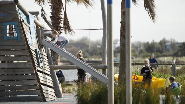 Families enjoying a morning at the playground on Monday. Picture: Daniel Pockett/Getty Images