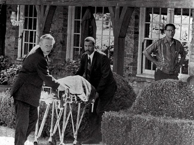 The body of actor Sharon Tate is taken from her Benedict Canyon estate on August 9, 1969.