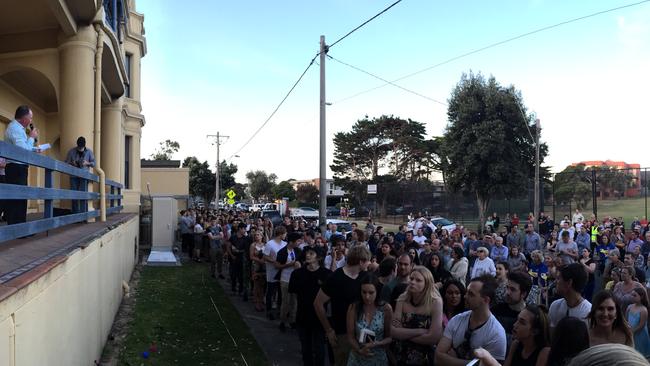 Clarke Martin speaks to a crowd gathered at the rally to save the Mentone Hotel. Picture: Sharon Green.