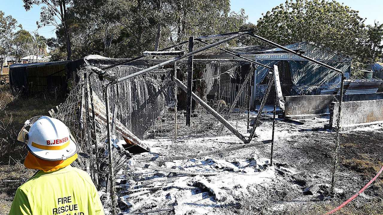 Firefighters put out a blaze in a structure behind a residence on Southerden St, Torquay. Picture: Alistair Brightman