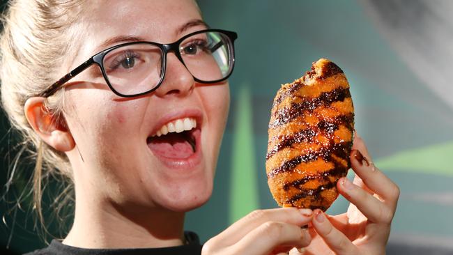 Supervisor Jade Dixon tucks into the dessert. Picture Glenn Hampson