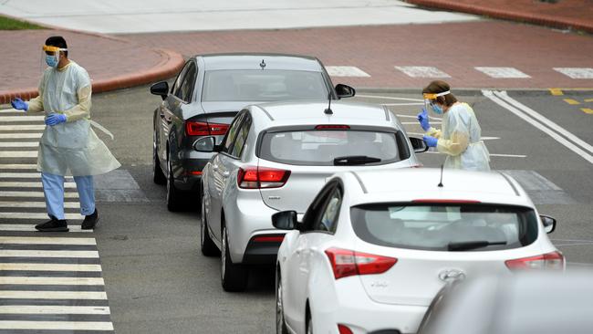 Cars queue at a pop-up COVID-19 testing centre at the Australian National Maritime Museum in Sydney. Picture: NCA NewsWire / Joel Carrett